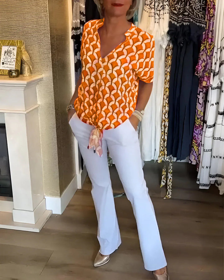 Emma™ | Elegante zomerblouse met knoopdetail