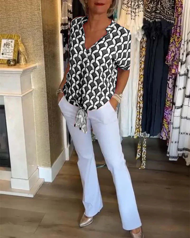 Emma™ | Elegante zomerblouse met knoopdetail