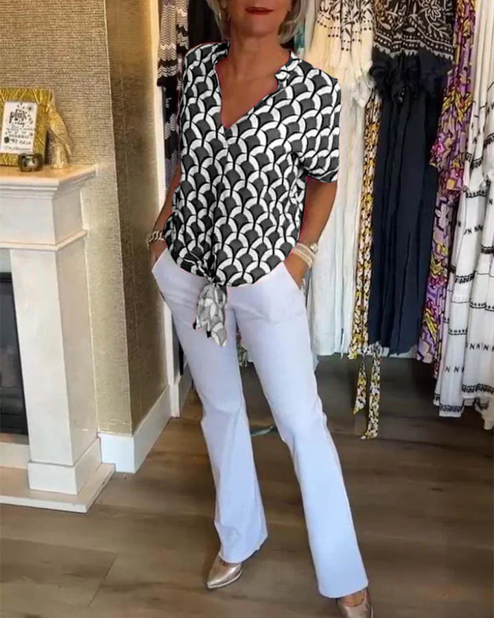 Emma™ | Elegante zomerblouse met knoopdetail