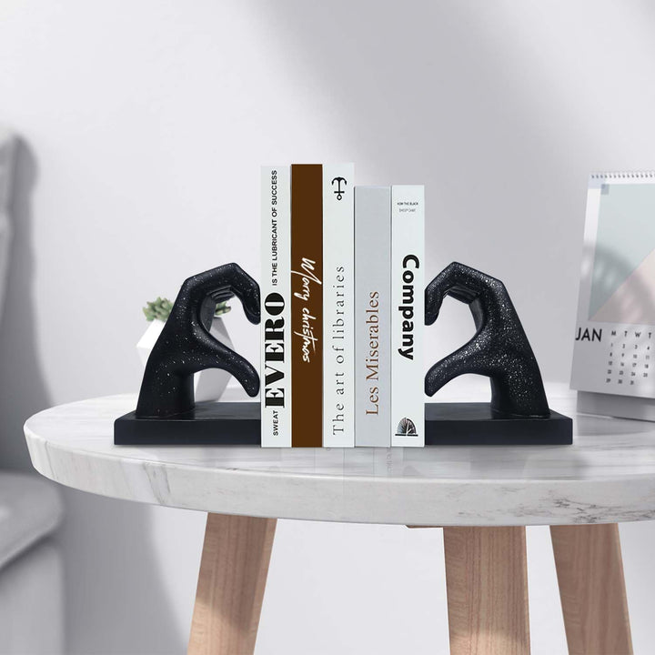 Decorative bookends in the shape of a hand