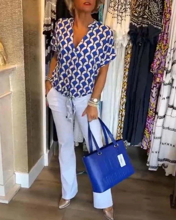 Emma™ | Elegante zomerblouse met knoopdetail