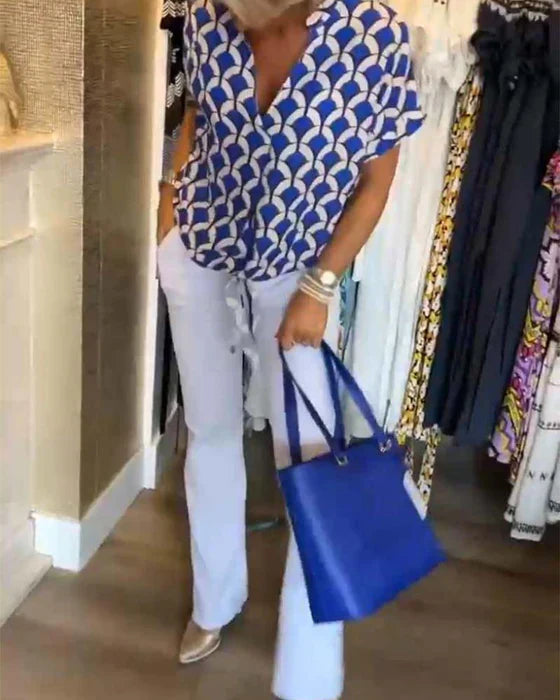 Emma™ | Elegante zomerblouse met knoopdetail