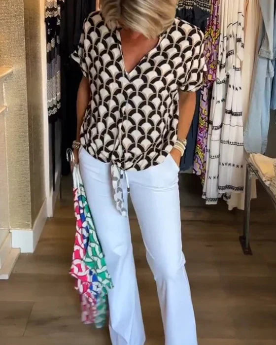 Emma™ | Elegante zomerblouse met knoopdetail