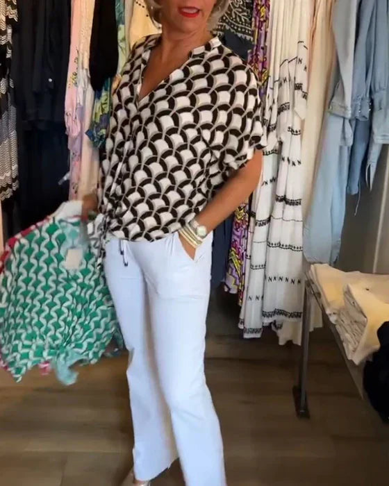 Emma™ | Elegante zomerblouse met knoopdetail